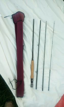 Cabelas 9 foot, three forks 4 piece fishing pole.
