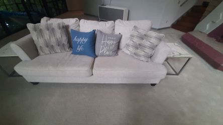 Upholstered beige sofa