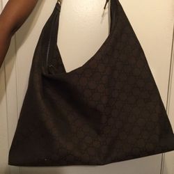 Authentic Gucci large hobo traveling bag , barley used