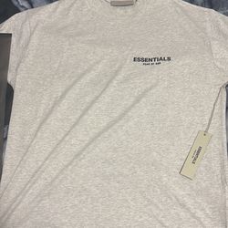 Light oatmeal essentials shirt size large.