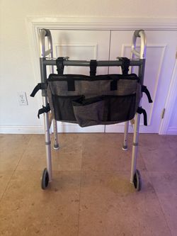 Brand new folding walker with bag