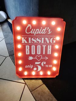 Metal sign with lights