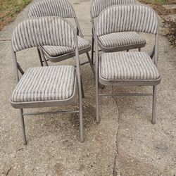 Price Is Firm.. Four Heavy Duty Folding Metal Chairs