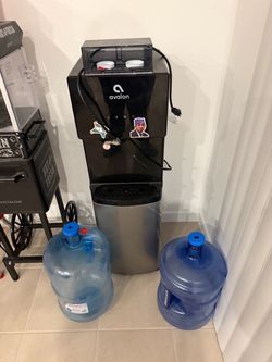 Avalon Top-Load Water Cooler Dispenser 3 5 gallon jugs.