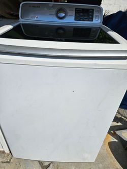 SAMSUNG washer and dryer in good working condition and sanitized and  very clean. Just need to remove 2 marks by adhesive tape. Holds maximum desired