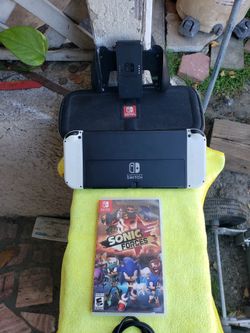 New Conditions Is White Edition 128GB Nintendo Switch OLED 2024 big Screen with Sonic Game, case & Charger. $230! Or trade for $300! Item or more. $23