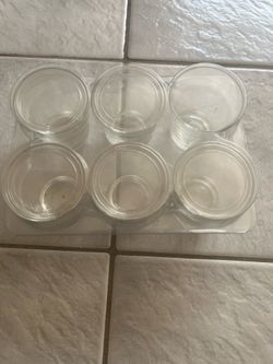Set of 6 Glasses with plastic covers (New) approx H3”W3” round.
