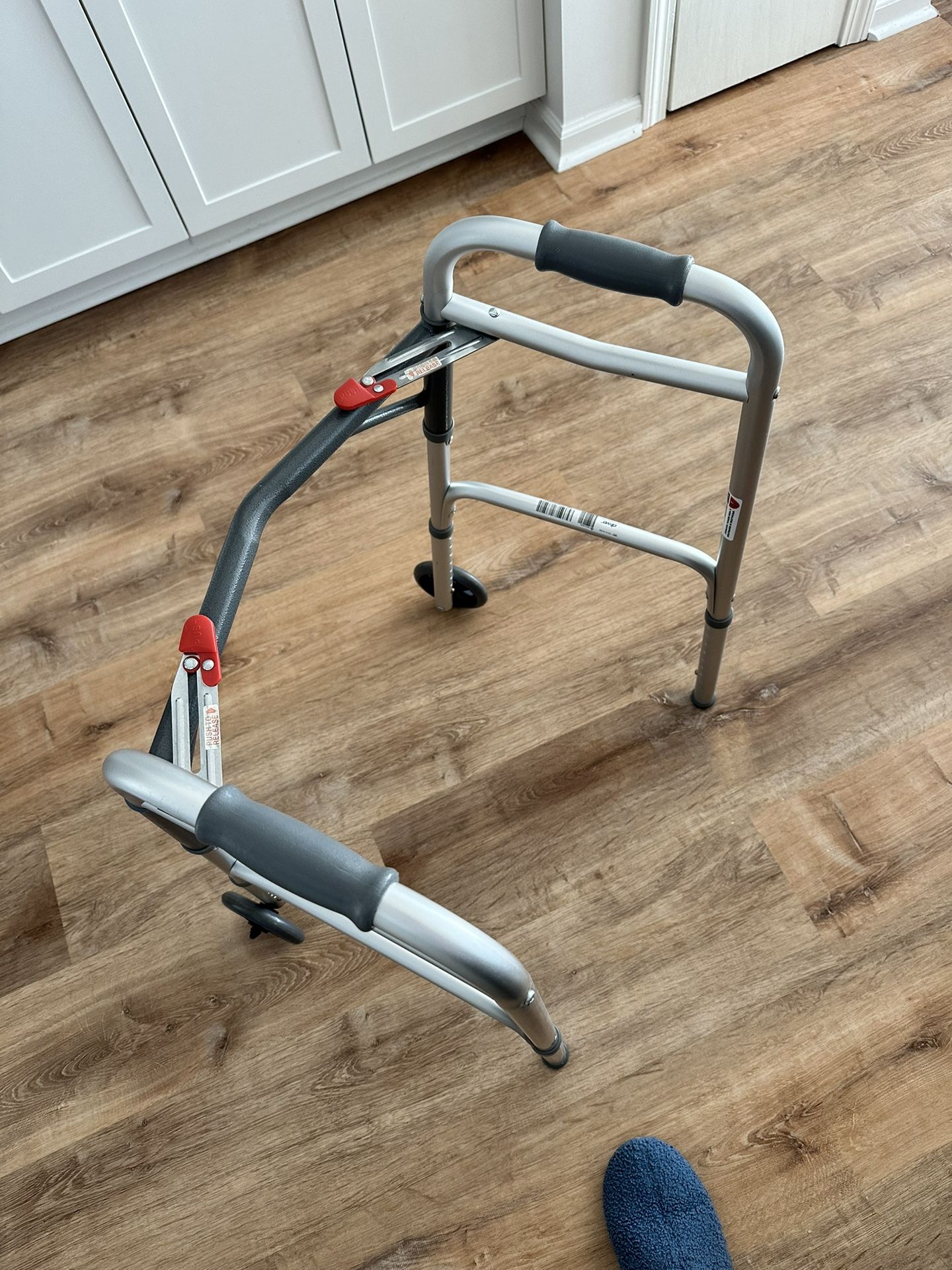 Like new Lightweight 2-Button Folding Rolling Walker For Seniors And Adults