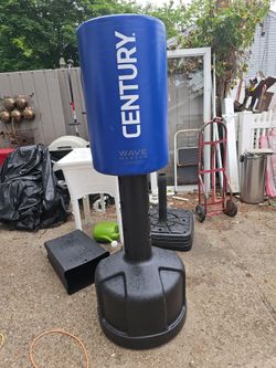 Price is firm.. century freestanding kickboxing punching bag.