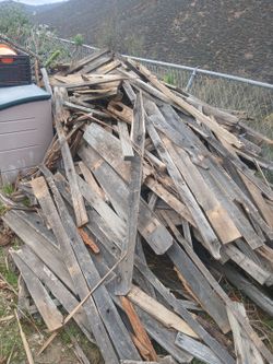 Reclaimed wood.  Some reusable, some junk, or firewood