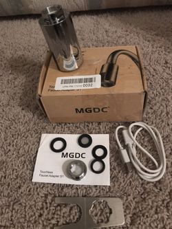 Touch less faucet spray head