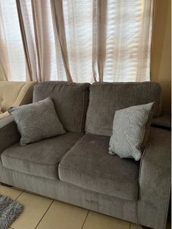 Grey fabric loveseat