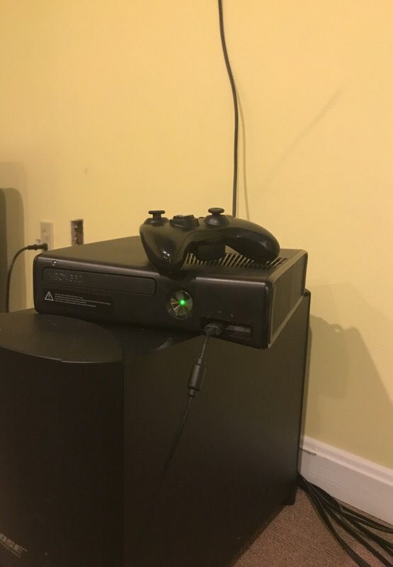 Xbox 360 and one controller. Fair condition