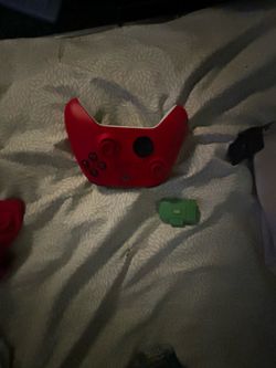 Red Xbox Wireless Controller with battery pack