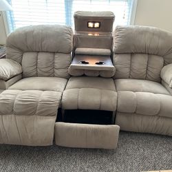 Recliner couch both ends armrest in the middle with lights