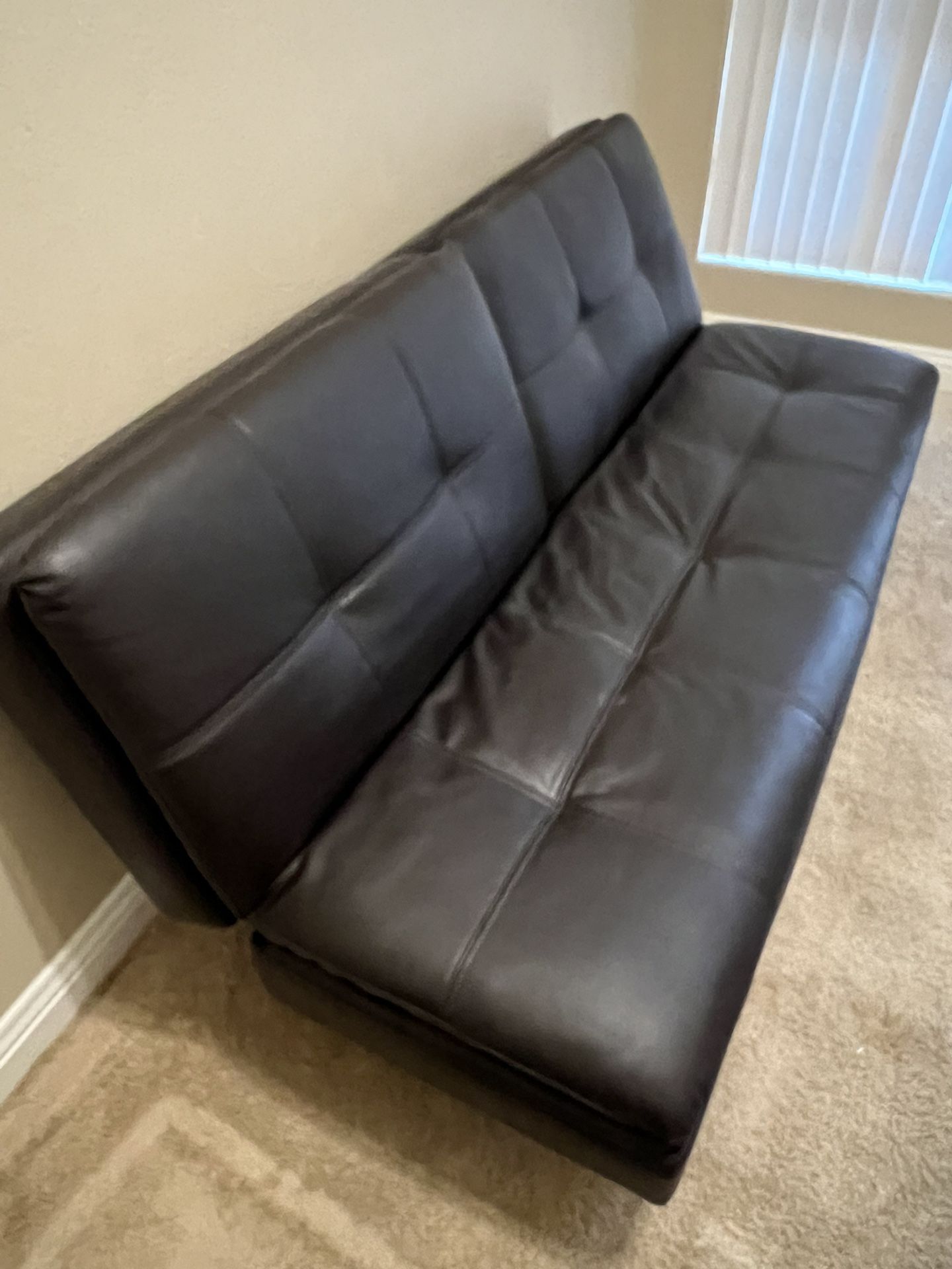 Leather futon like new condition