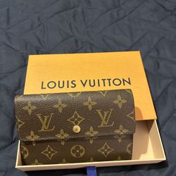 Louis Vuitton clutch wallet
