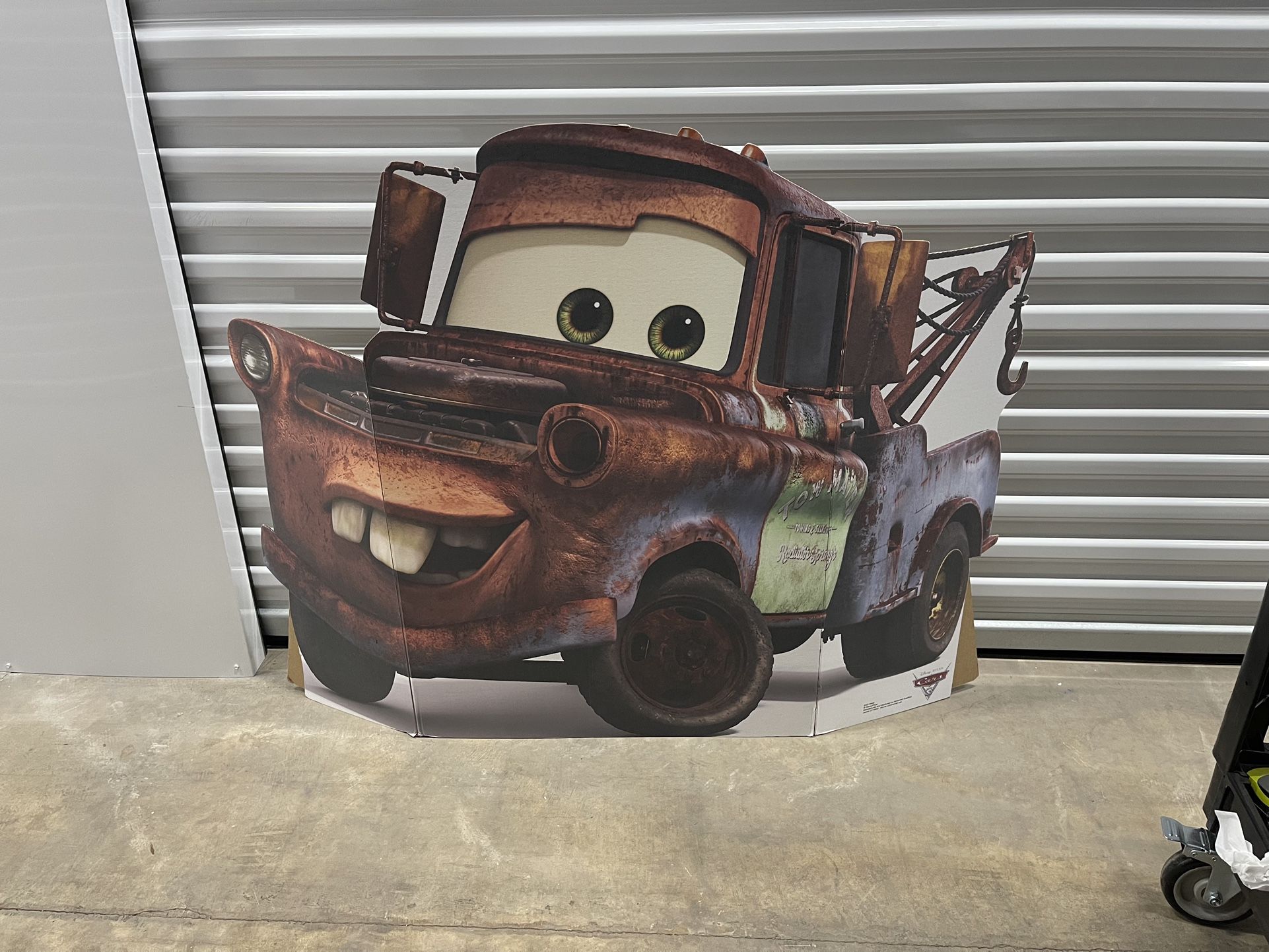 cardboard cutout of car mater 
