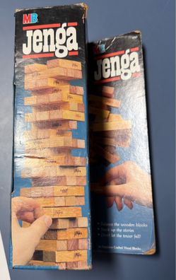 The Milton Bradley Jenga Skill & Action Game is a complete game designed for 2 players aged 8 and up. This strategy-themed game features 54 precision-