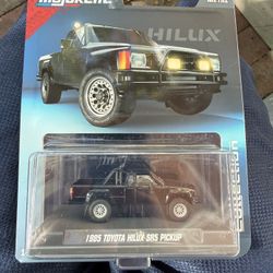 Majorette Collection 1985 Toyota Hilux SR5 Pickup Black 1:64 Scale