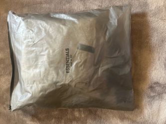Essentials sweats , size small ,dark oatmeal color way.