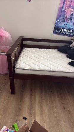 Twin bed w/ like new mattress.