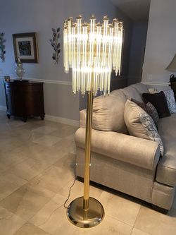 5 foot tall crystal teardrop floor lamp, hand lit with 3 sensors. New cost $ 600.00 special sale ($ 240.00) bronze finishes like new. Used.