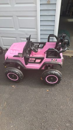 Pink power wheel jeep