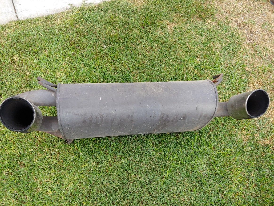 Nissan 350Z OEM muffler with chrome tips and a Borla resonator