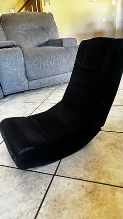 Collapsing floor gaming chair