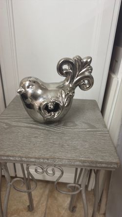 Metallic metallic silver finish ceramic deco bird, swirl designs,