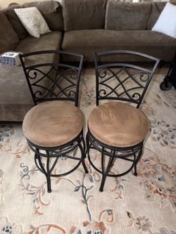 Pair of Metal Swivel Bar Stools with Brown Upholstered Seats