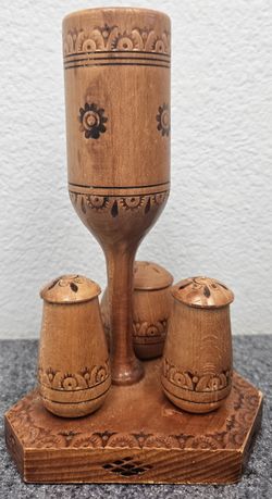 Decorative Wooden salt and pepper holder.