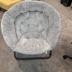 Two Cushioned Folding Chairs