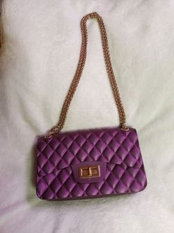 Purple silicon purse $6