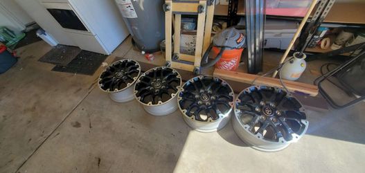 Toyota OEM wheels. 6 Lug, 18 Inch, Black/silver
