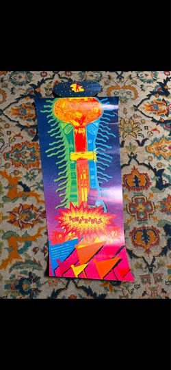 1991 bumbershoot festival poster. 38” to longest end. Top piece folds up. Has rips, pin holes, and wear throughout. Stored rolled up so needs to be fl