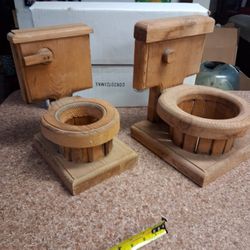 Wooden toilet bowl planters.