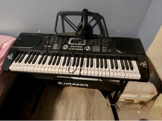 Hamzer Electric Music Keyboard with stand and stool.
