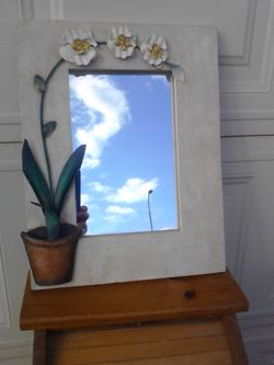 Decorative mirror with orchid plant applique