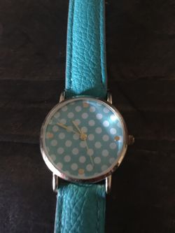 Teal watch with polka dots