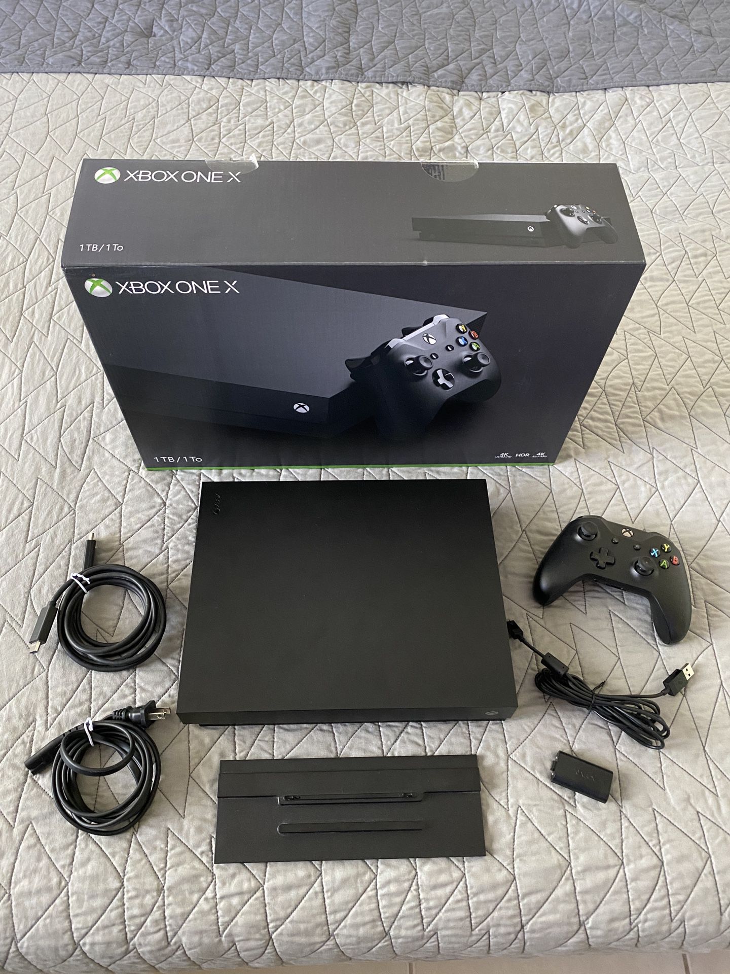 XBOX ONE X with original box and accessories.