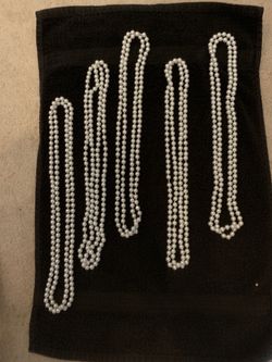Faux pearls 60” strands