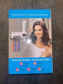 NIB Multi Function Toothbrush Sterilizer and Dispenser