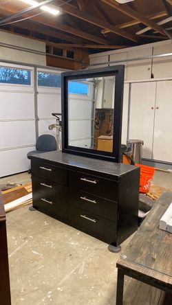 Dresser with a big mirror
