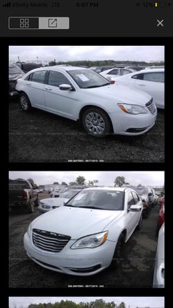2012 Chrysler 200, 2.4 engine , auto trans, 110,000 SCARP Title, can never be on the road- for parts only