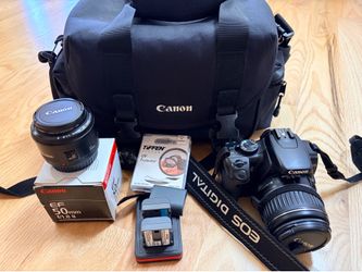 Canon EOS 400D with lenses, battery, carry case