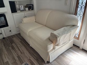 White beige loveseats