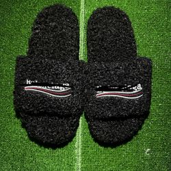 Black Balenciaga fur slides