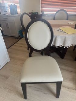 A set of four dining room chairs